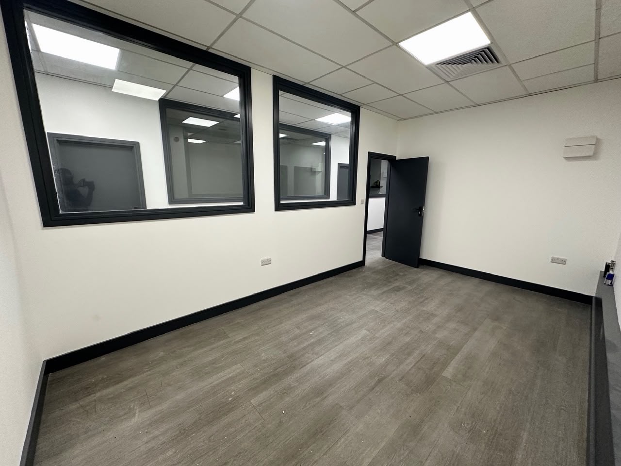 Interior of a 16 square metre unit with its own door and wide glazing